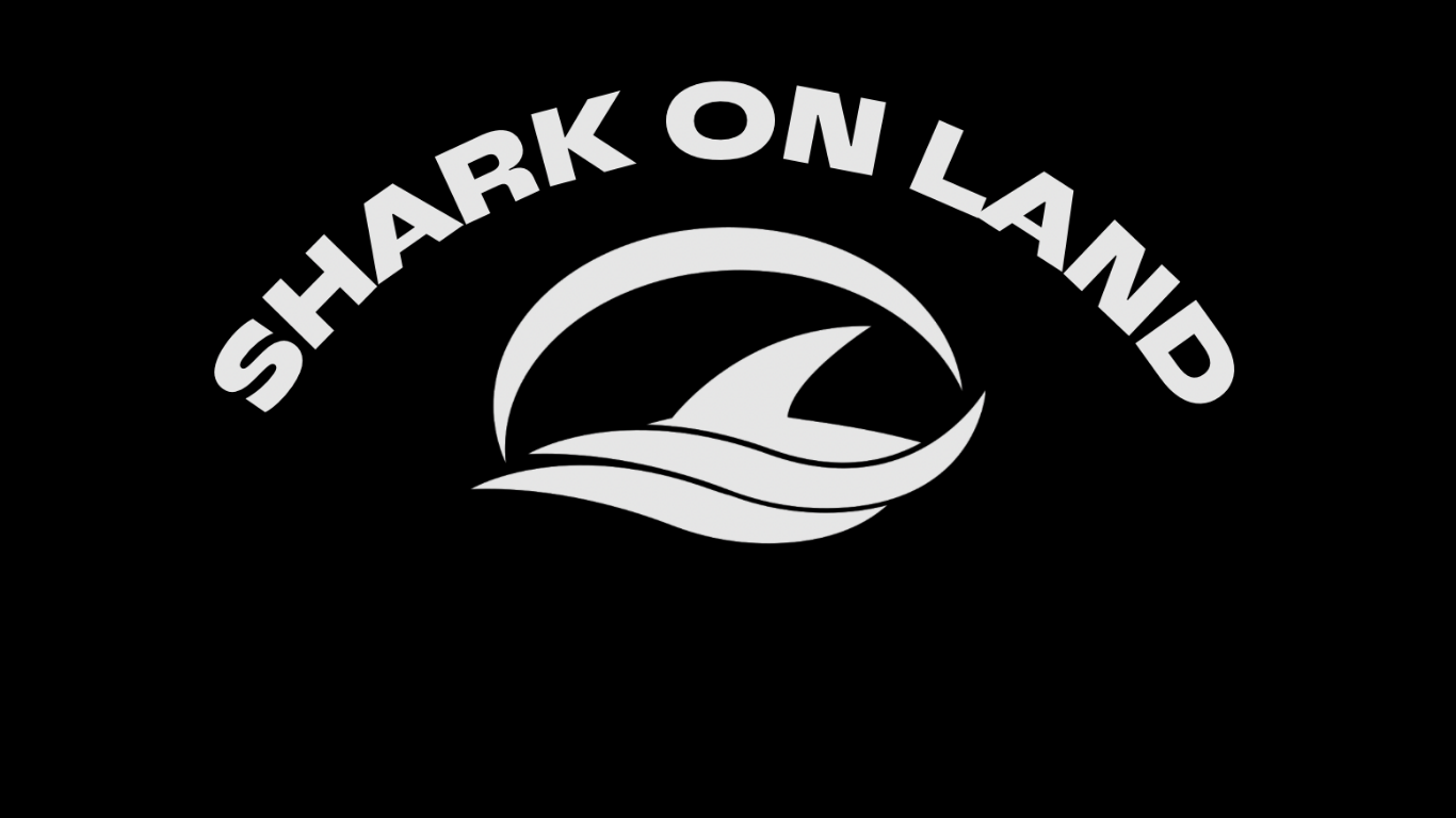 Shark On Land Logo